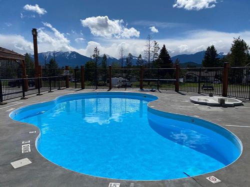 2203 - 7495 Columbia Avenue, Radium Hot Springs, BC - Outdoor With In Ground Pool With Backyard