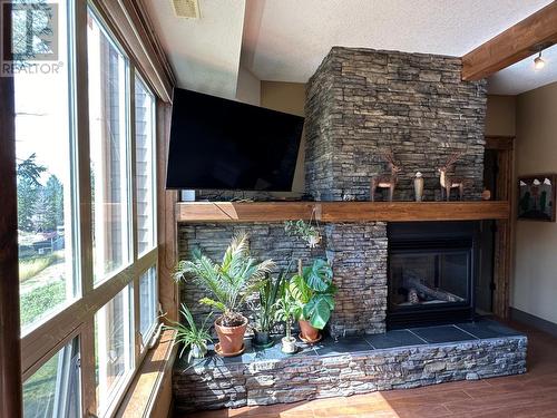 7495 Columbia  Avenue Unit# 2203, Radium Hot Springs, BC - Indoor With Fireplace