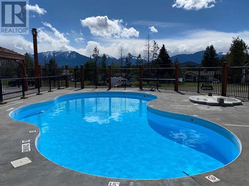 7495 Columbia Avenue Unit# 2203, Radium Hot Springs, BC - Outdoor With In Ground Pool With Backyard