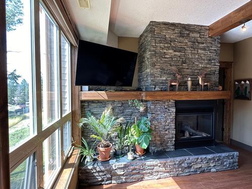 2203 - 7495 Columbia Avenue, Radium Hot Springs, BC - Indoor With Fireplace