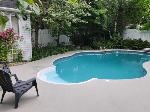 Pool - 370 Rue Léotable-Dubuc, La Prairie, QC - Outdoor With In Ground Pool With Backyard