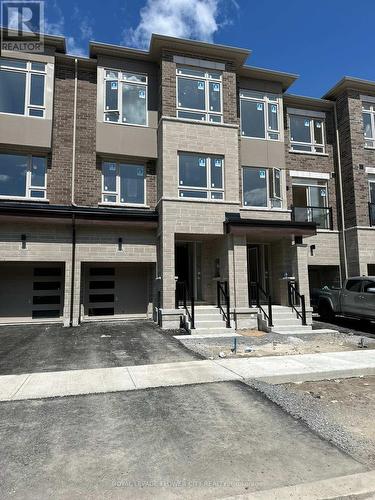 199 Tennant Circle, Vaughan, ON - Outdoor With Balcony With Facade