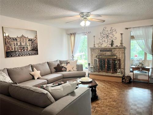 76 High Point Drive, Winnipeg, MB - Indoor Photo Showing Living Room With Fireplace