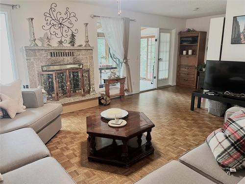 76 High Point Drive, Winnipeg, MB - Indoor Photo Showing Living Room With Fireplace