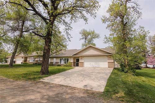 52 Centre Avenue E, Carman, MB - Outdoor With Facade