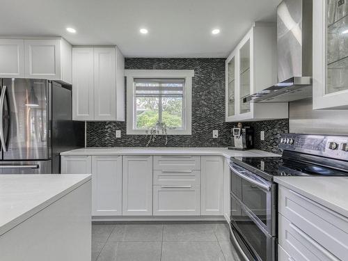 Cuisine - 1915 54E Avenue (P.-A.-T.), Montréal (Rivière-Des-Prairies/Pointe-Aux-Trembles), QC - Indoor Photo Showing Kitchen With Upgraded Kitchen