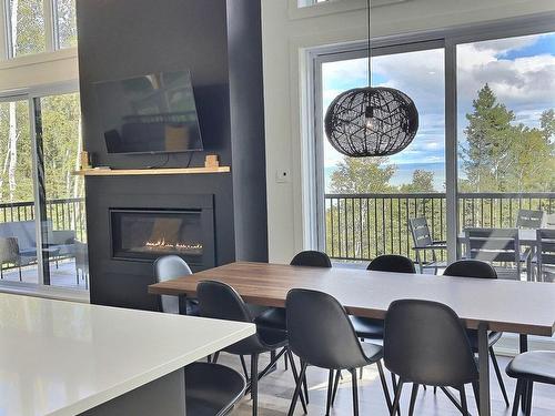 Dining room - 1578 Ch. Des Hauts-Bois, Saint-Irénée, QC - Indoor Photo Showing Dining Room With Fireplace