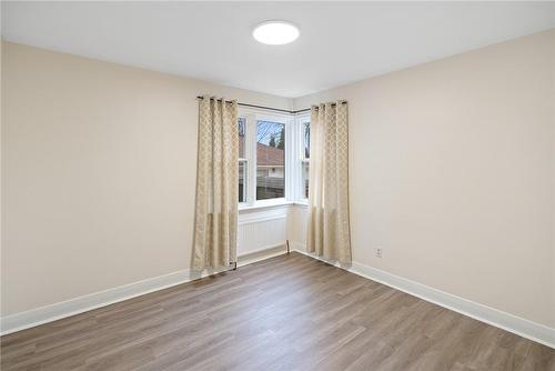 Main floor secondary bedroom - 19 Fawell Avenue, St. Catharines, ON - Indoor Photo Showing Other Room