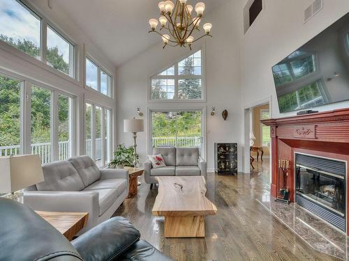 Salon - 25 Ch. Des Amarantes, Sainte-Anne-Des-Lacs, QC - Indoor Photo Showing Living Room With Fireplace