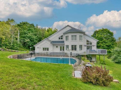 Overall view - 25 Ch. Des Amarantes, Sainte-Anne-Des-Lacs, QC - Outdoor With In Ground Pool With Backyard