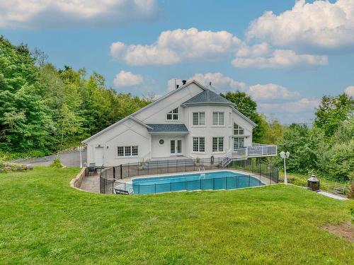 Overall view - 25 Ch. Des Amarantes, Sainte-Anne-Des-Lacs, QC - Outdoor With In Ground Pool With Backyard