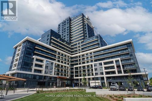 916 - 3220 William Coltson Avenue, Oakville, ON - Outdoor With Balcony With Facade