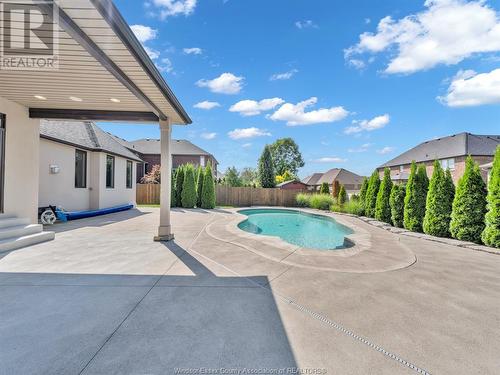 1104 Charlotte Crescent, Lakeshore, ON - Outdoor With In Ground Pool