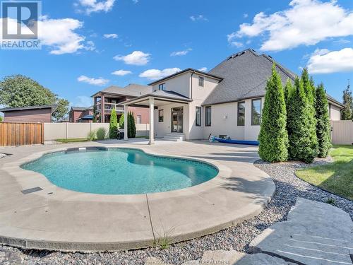 1104 Charlotte Crescent, Lakeshore, ON - Outdoor With In Ground Pool