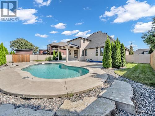 1104 Charlotte Crescent, Lakeshore, ON - Outdoor With In Ground Pool