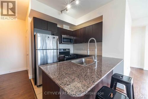 911 - 385 Prince Of Wales Drive, Mississauga (City Centre), ON - Indoor Photo Showing Kitchen With Stainless Steel Kitchen With Upgraded Kitchen