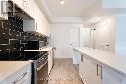 223 - 1070 Douglas Mccurdy Comm, Mississauga (Lakeview), ON - Indoor Photo Showing Kitchen