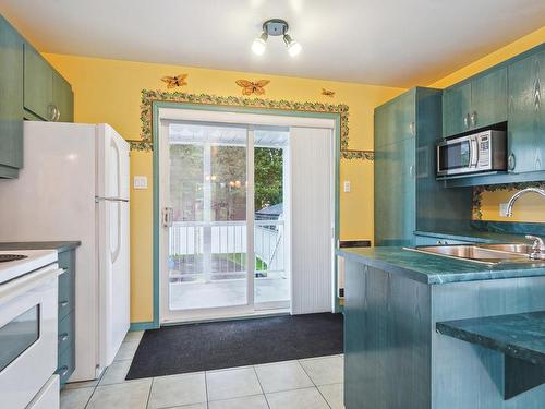 Cuisine - 72 Rue Ste-Anne, L'Épiphanie, QC - Indoor Photo Showing Kitchen With Double Sink