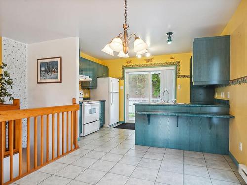 Dining room - 72 Rue Ste-Anne, L'Épiphanie, QC - Indoor Photo Showing Kitchen