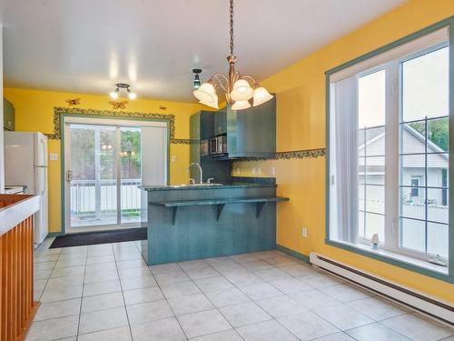 Dining room - 72 Rue Ste-Anne, L'Épiphanie, QC - Indoor Photo Showing Kitchen