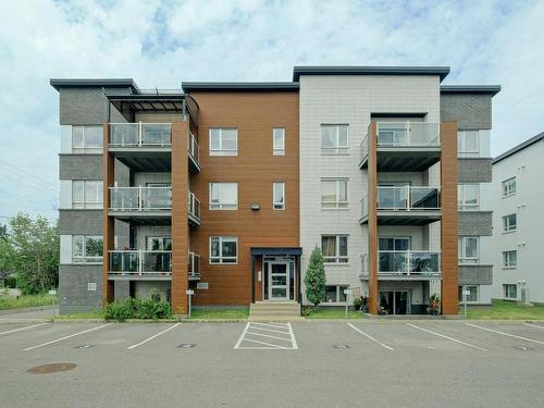 Frontage - P-03-150 Rue De La Maçonnerie, Châteauguay, QC - Outdoor With Balcony With Facade