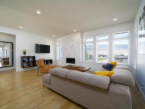 135 Cavesson Way, Kamloops, BC - Indoor Photo Showing Living Room With Fireplace