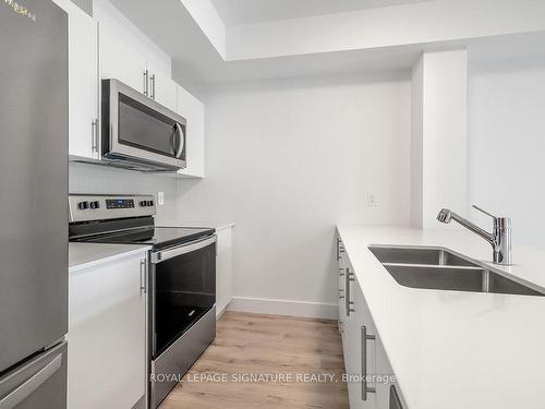 325-4 Kimberly Lane, Collingwood, ON - Indoor Photo Showing Kitchen With Double Sink