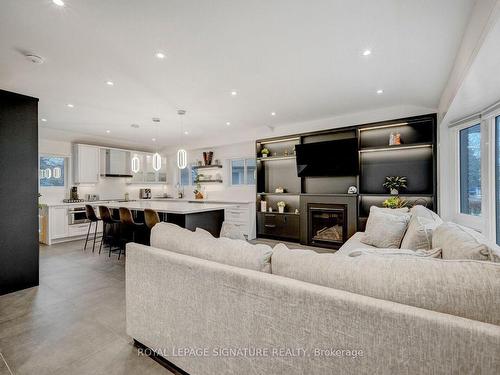 26 Vanderbrent Cres, Toronto, ON - Indoor Photo Showing Living Room With Fireplace