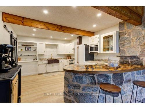 9811 Creek Rd, Minto, ON - Indoor Photo Showing Kitchen With Double Sink