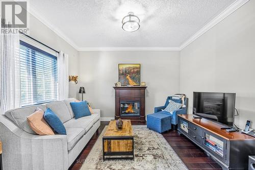 412 - 43 Ferndale Drive S, Barrie (Ardagh), ON - Indoor Photo Showing Living Room With Fireplace