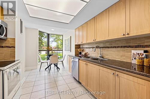 101 - 1155 Bough Beeches Boulevard, Mississauga (Rathwood), ON - Indoor Photo Showing Kitchen With Double Sink