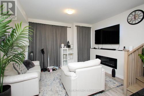 1703 Pleasure Valley Path, Oshawa, ON - Indoor Photo Showing Living Room With Fireplace