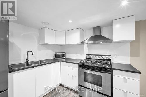 Lower - 1 Queen Isabella Crescent, Vaughan, ON - Indoor Photo Showing Kitchen With Double Sink