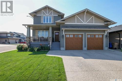 4824 Mccombie Crescent, Regina, SK - Outdoor With Deck Patio Veranda With Facade