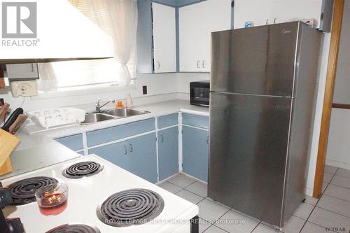 102 Lang Street, Cobalt, ON - Indoor Photo Showing Kitchen With Double Sink