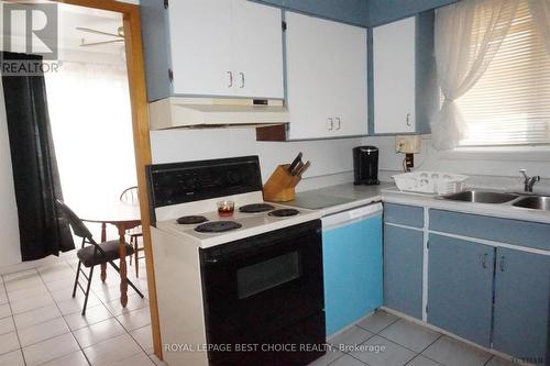 102 Lang Street, Cobalt, ON - Indoor Photo Showing Kitchen With Double Sink