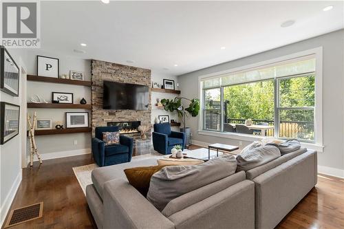 22 Annfield Court, Moncton, NB - Indoor Photo Showing Living Room With Fireplace