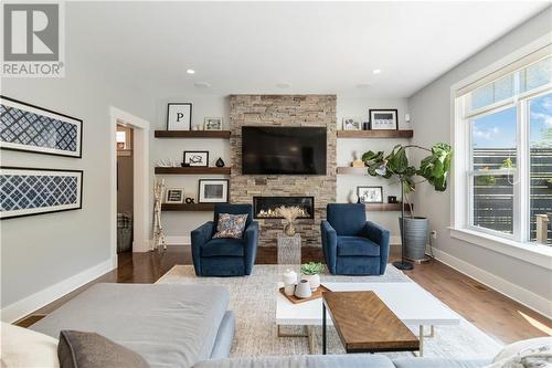 22 Annfield Court, Moncton, NB - Indoor Photo Showing Living Room With Fireplace