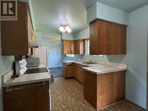 4833 Loen Avenue, Terrace, BC - Indoor Photo Showing Kitchen With Double Sink