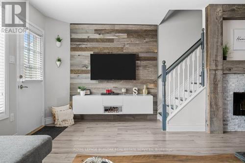 55 - 120 Quigley Road, Hamilton (Vincent), ON - Indoor Photo Showing Other Room With Fireplace