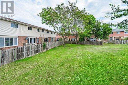 55 - 120 Quigley Road, Hamilton (Vincent), ON - Outdoor With Backyard