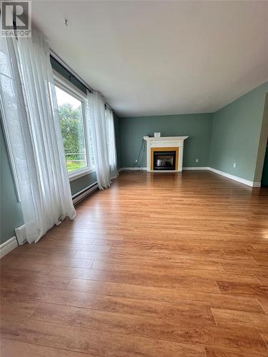 6 Stoodley Hill, Lance Aux Loupe, Grand Bank, NL - Indoor Photo Showing Living Room With Fireplace