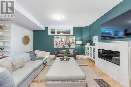 1 Hunt Club Drive, Toronto (Birchcliffe-Cliffside), ON - Indoor Photo Showing Living Room With Fireplace