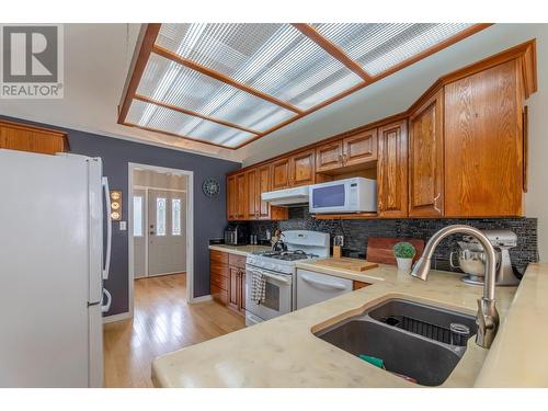 12700 Morrow Avenue, Summerland, BC - Indoor Photo Showing Kitchen With Double Sink