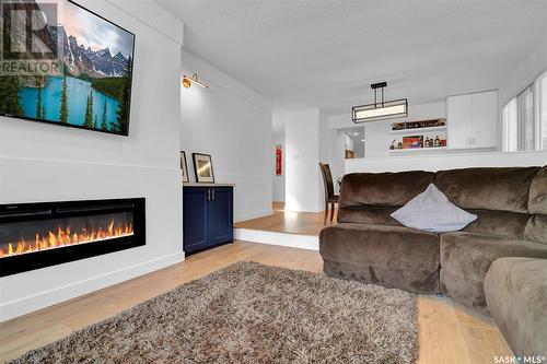 4822 Queen Street, Regina, SK - Indoor Photo Showing Living Room With Fireplace