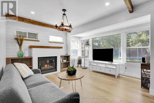 Attached Cottage/ In-Law  -One Floor Dwelling - 46277 Sparta Line, Central Elgin (Sparta), ON - Indoor Photo Showing Living Room With Fireplace