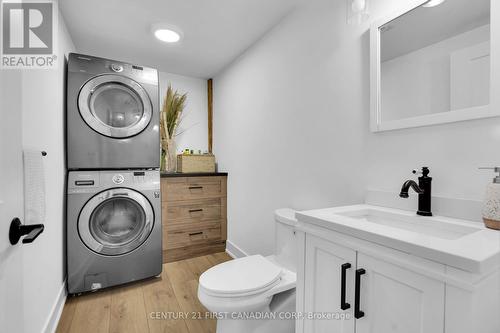 Main House- Main Fl- 2nd Bedroom - 46277 Sparta Line, Central Elgin (Sparta), ON - Indoor Photo Showing Laundry Room