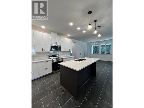 4109 Golden Place, Terrace, BC - Indoor Photo Showing Kitchen With Double Sink