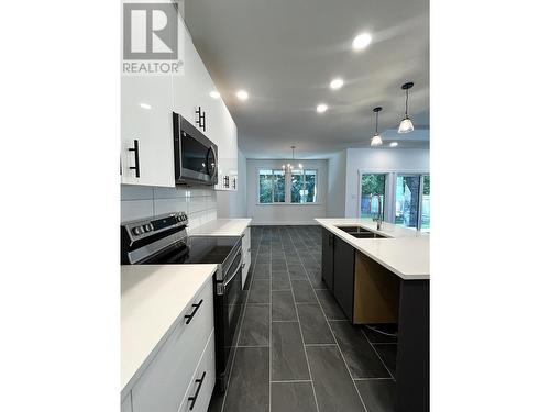 4109 Golden Place, Terrace, BC - Indoor Photo Showing Kitchen With Double Sink With Upgraded Kitchen