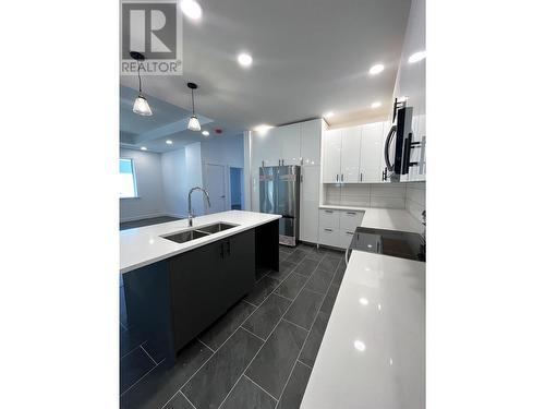 4109 Golden Place, Terrace, BC - Indoor Photo Showing Kitchen With Double Sink